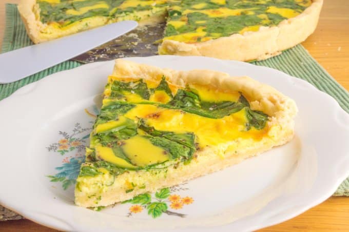slice of spinach and cheese quiche